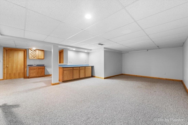40 S Juniper Dr, North Aurora, IL 60542 - finished below grade area with bar with sink, light carpet, and a drop ceiling