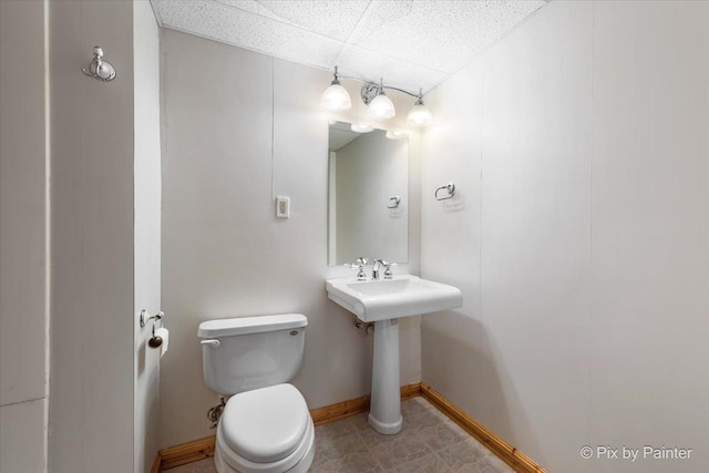 40 S Juniper Dr, North Aurora, IL 60542 - half bathroom featuring a drop ceiling and baseboards