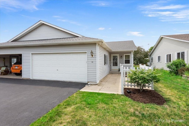 40 S Juniper Dr, North Aurora, IL 60542 - single story home with a shingled roof, driveway, a garage, and a front yard
