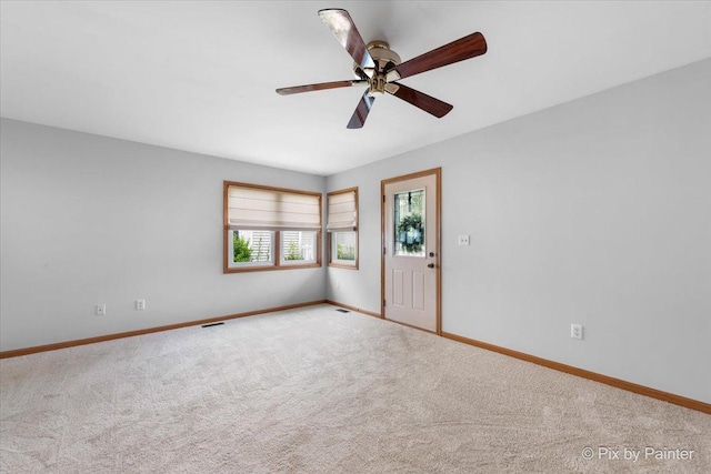 40 S Juniper Dr, North Aurora, IL 60542 - carpeted spare room featuring baseboards and ceiling fan