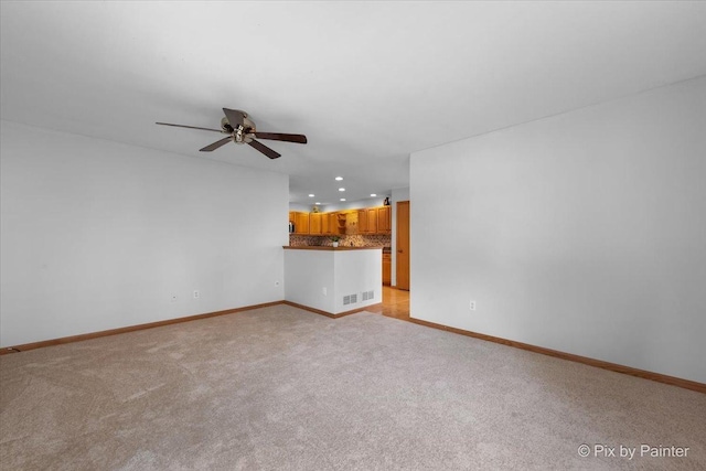 40 S Juniper Dr, North Aurora, IL 60542 - unfurnished living room featuring recessed lighting, a ceiling fan, and light colored carpet