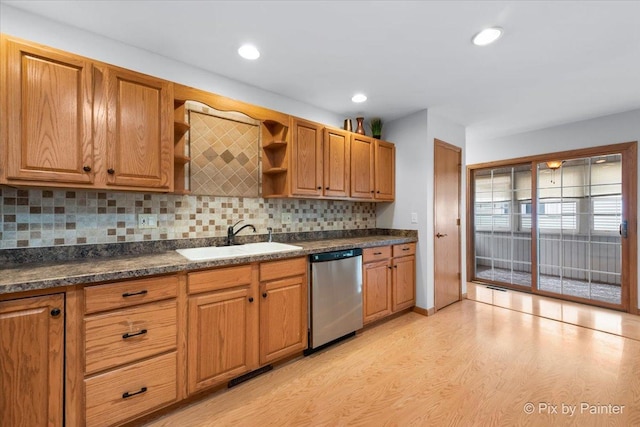 40 S Juniper Dr, North Aurora, IL 60542 - kitchen with light wood-style floors, open shelves, stainless steel dishwasher, dark countertops, and tasteful backsplash