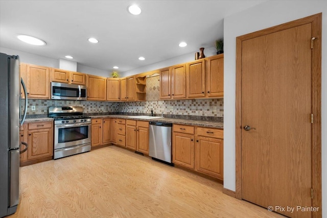 40 S Juniper Dr, North Aurora, IL 60542 - kitchen featuring stainless steel appliances, light wood-style flooring, open shelves, tasteful backsplash, and recessed lighting