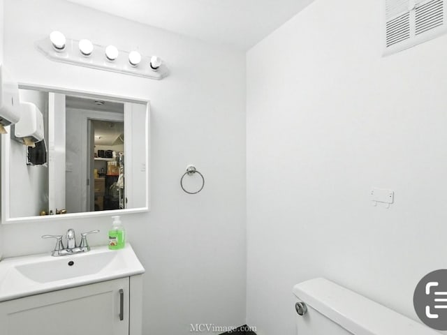 216 Cheshire Ct, Bolingbrook, IL 60440 - bathroom featuring vanity and toilet
