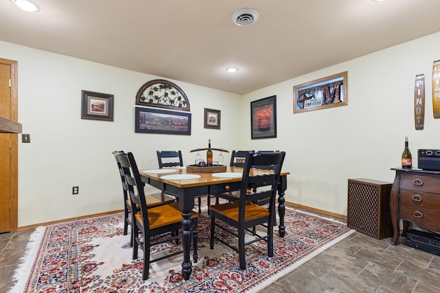 3792 Foxglove Ln, Winnebago, IL 61088 - dining space with stone finish flooring and recessed lighting