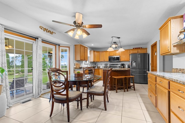 3792 Foxglove Ln, Winnebago, IL 61088 - dining room featuring a ceiling fan and light tile patterned floors