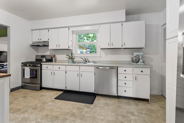 2305 Glenoak Dr, Champaign, IL 61821 - kitchen with appliances with stainless steel finishes, under cabinet range hood, light stone finish flooring, and light countertops