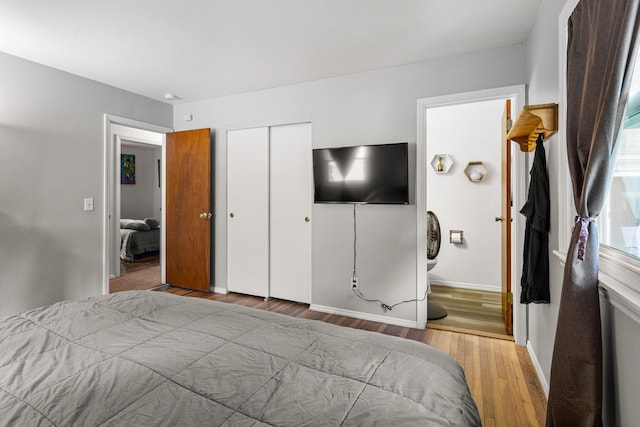 2305 Glenoak Dr, Champaign, IL 61821 - bedroom with wood finished floors and a closet