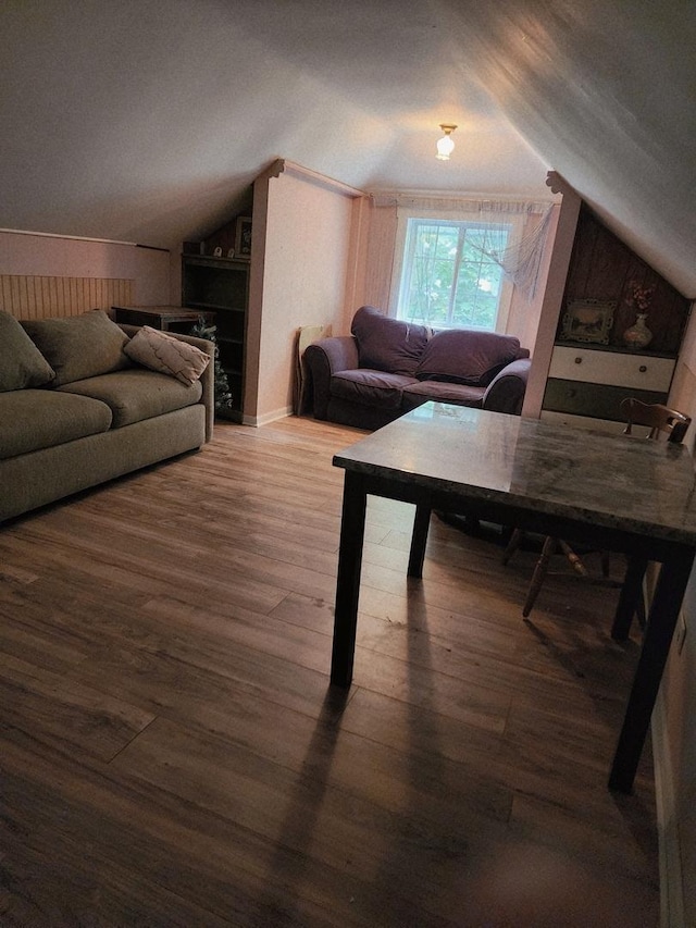 94 E Lakeview Ave, Round Lake Beach, IL 60073 - living room with vaulted ceiling, wood finished floors, and wooden walls