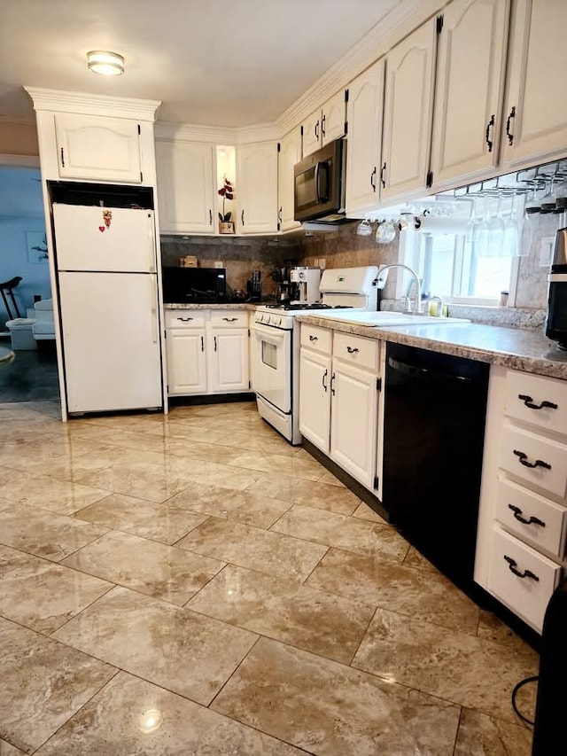 94 E Lakeview Ave, Round Lake Beach, IL 60073 - kitchen featuring white appliances, white cabinetry, and decorative backsplash