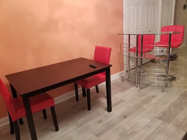 94 E Lakeview Ave, Round Lake Beach, IL 60073 - dining area with baseboards and wood finished floors
