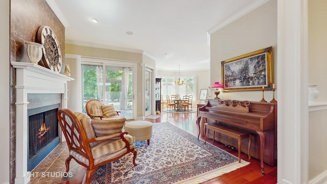 870 Legacy Rdg, Algonquin, IL 60102 - living room featuring crown molding, a lit fireplace, and wood finished floors
