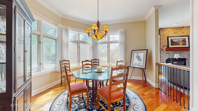 870 Legacy Rdg, Algonquin, IL 60102 - dining area featuring a chandelier, light wood-type flooring, and crown molding