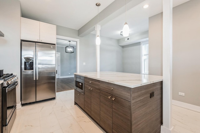 1535 W Estes Ave Unit 4, Chicago, IL 60626 - kitchen with stainless steel appliances, light marble finish floors, dark brown cabinets, decorative light fixtures, and light stone countertops