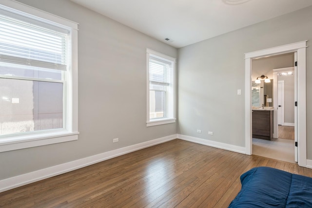 1535 W Estes Ave Unit 4, Chicago, IL 60626 - unfurnished bedroom with hardwood / wood-style floors and baseboards