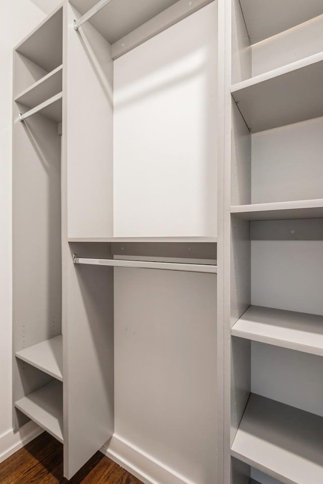 1535 W Estes Ave Unit 4, Chicago, IL 60626 - walk in closet with dark wood-style floors