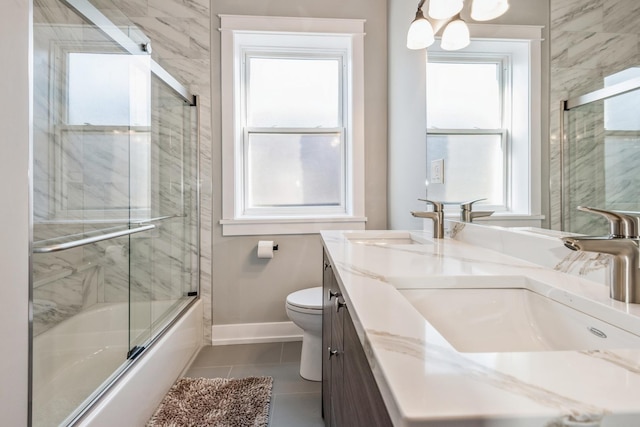 1535 W Estes Ave Unit 4, Chicago, IL 60626 - full bathroom with vanity, combined bath / shower with glass door, and tile patterned floors
