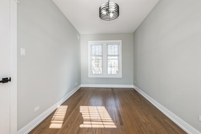1535 W Estes Ave Unit 4, Chicago, IL 60626 - unfurnished room featuring baseboards and dark wood finished floors