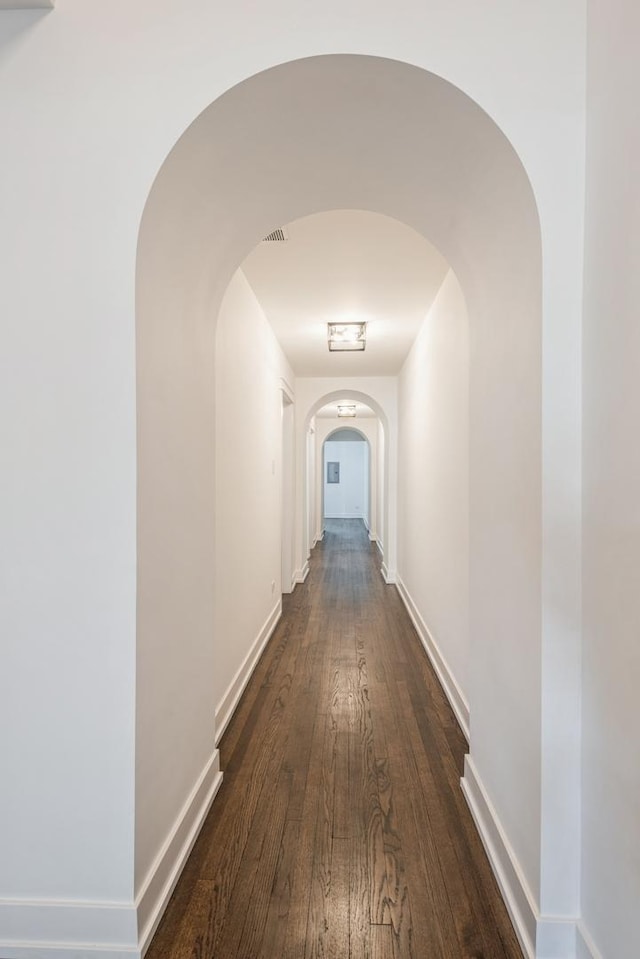 1535 W Estes Ave Unit 4, Chicago, IL 60626 - corridor featuring dark wood finished floors and arched walkways