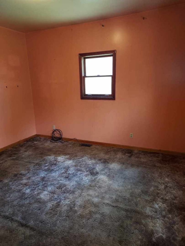 501 S Spruce St, Villa Grove, IL 61956 - unfurnished room featuring carpet