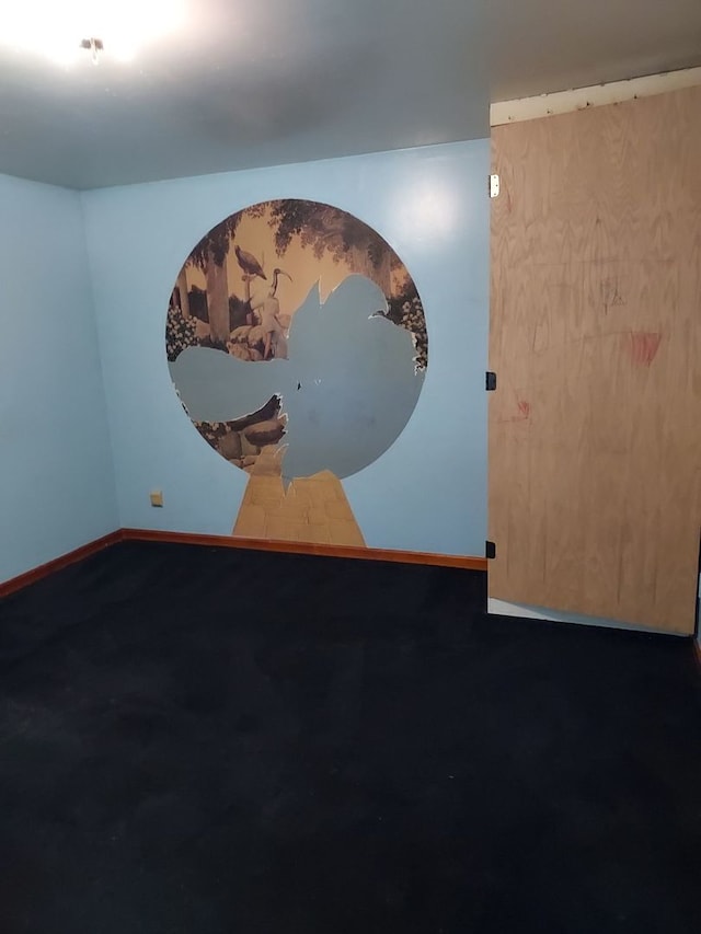 501 S Spruce St, Villa Grove, IL 61956 - carpeted spare room featuring baseboards