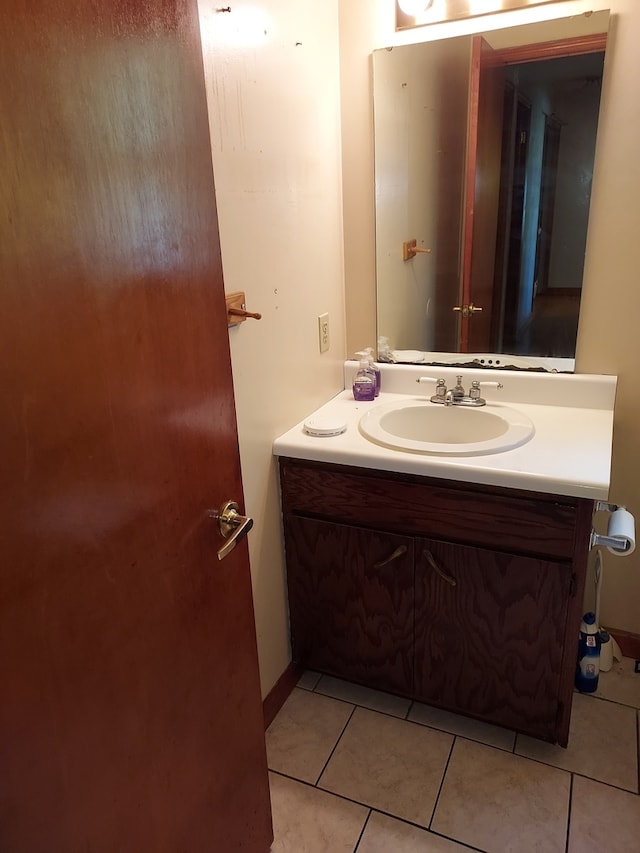 501 S Spruce St, Villa Grove, IL 61956 - bathroom with vanity and tile patterned flooring