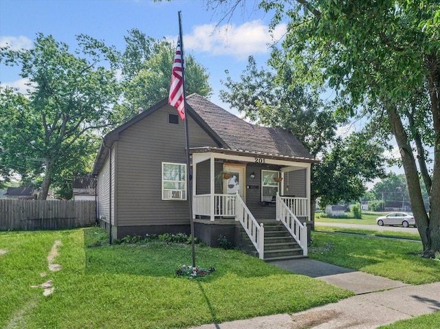 201 N Sycamore St, Villa Grove, IL 61956 - bungalow-style home with a porch