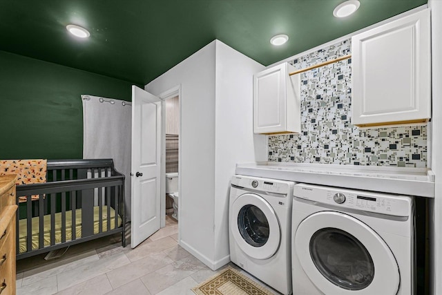 201 N Sycamore St, Villa Grove, IL 61956 - laundry area featuring separate washer and dryer and cabinet space