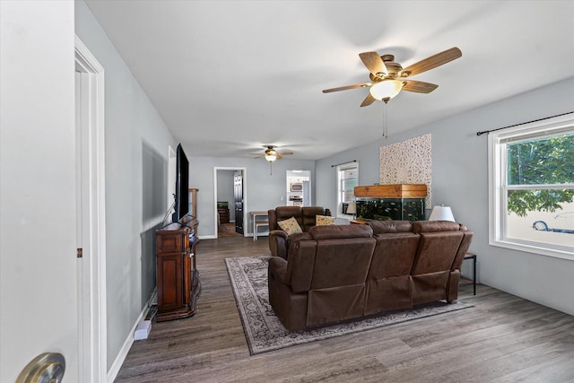 201 N Sycamore St, Villa Grove, IL 61956 - living room with ceiling fan and dark wood finished floors