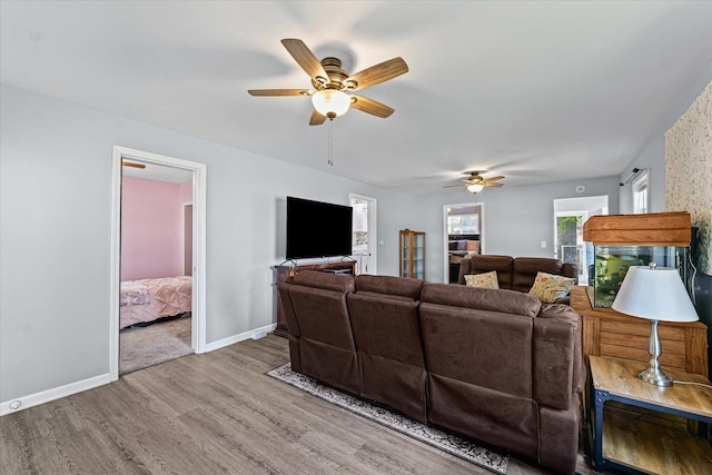 201 N Sycamore St, Villa Grove, IL 61956 - living area with wood finished floors and ceiling fan
