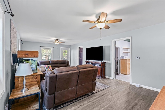 201 N Sycamore St, Villa Grove, IL 61956 - living area featuring a ceiling fan and light wood finished floors