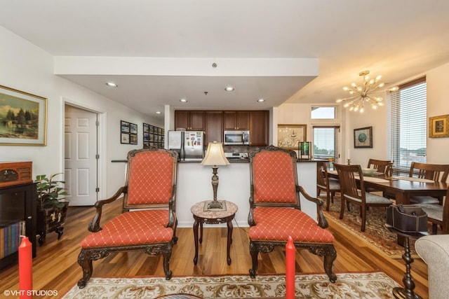 3450 S Halsted St Unit 416, Chicago, IL 60608 - living area featuring wood finished floors, a chandelier, and recessed lighting