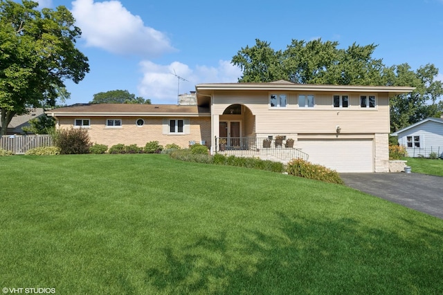 1142 N Perry Dr, Palatine, IL 60067 - tri-level home with an attached garage, driveway, and french doors