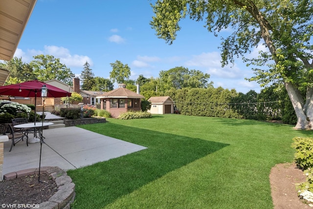 1142 N Perry Dr, Palatine, IL 60067 - view of green lawn featuring a patio and a storage shed