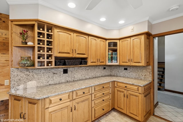 1142 N Perry Dr, Palatine, IL 60067 - kitchen with open shelves, light stone counters, crown molding, glass insert cabinets, and decorative backsplash