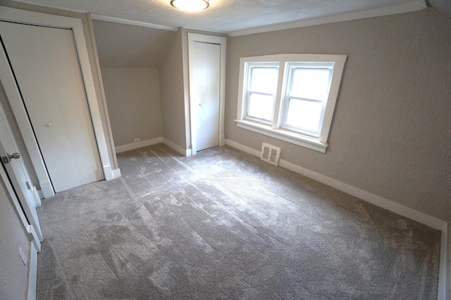 2524 N Mont Clare Ave, Chicago, IL 60707 - unfurnished bedroom featuring two closets and carpet floors