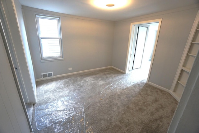 2524 N Mont Clare Ave, Chicago, IL 60707 - unfurnished room with carpet floors and baseboards