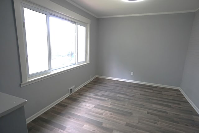 2524 N Mont Clare Ave, Chicago, IL 60707 - empty room featuring wood finished floors and ornamental molding