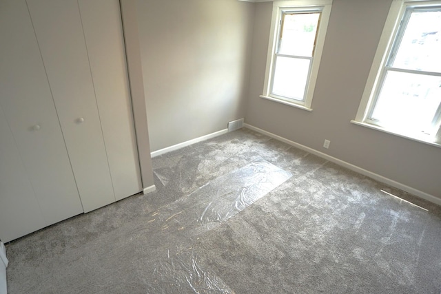 2524 N Mont Clare Ave, Chicago, IL 60707 - unfurnished bedroom featuring carpet floors and baseboards