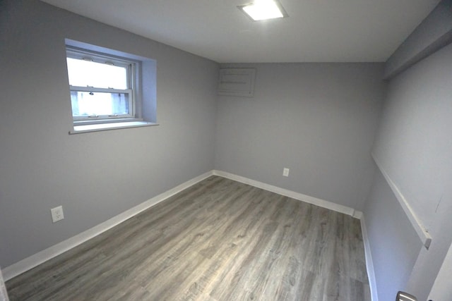 2524 N Mont Clare Ave, Chicago, IL 60707 - spare room with wood finished floors and baseboards