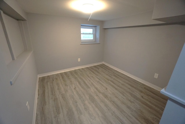 2524 N Mont Clare Ave, Chicago, IL 60707 - below grade area with wood finished floors and baseboards