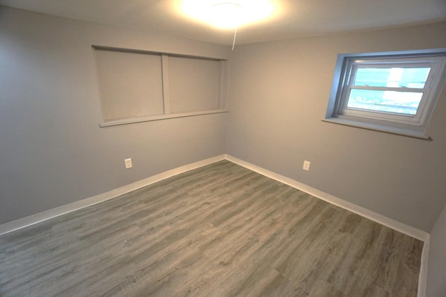 2524 N Mont Clare Ave, Chicago, IL 60707 - spare room with wood finished floors and baseboards