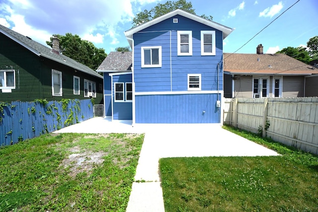2524 N Mont Clare Ave, Chicago, IL 60707 - back of house featuring a patio and a fenced backyard