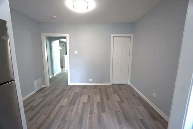 2524 N Mont Clare Ave, Chicago, IL 60707 - unfurnished room featuring wood finished floors and baseboards