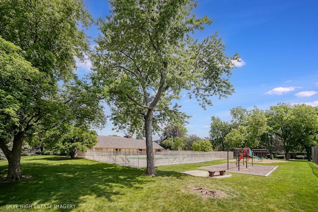 128 E Bailey Rd Unit G, Naperville, IL 60565 - fenced backyard featuring a playground