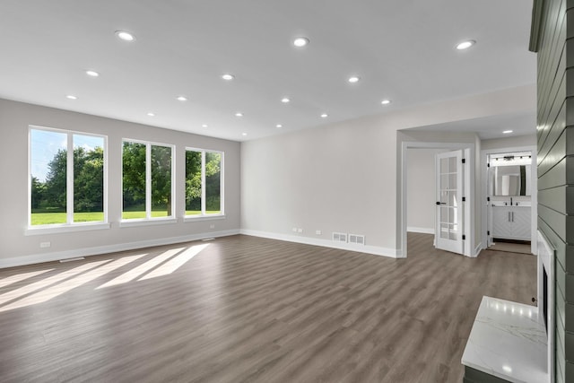 2054 S Jonathan Dr, Round Lake, IL 60073 - unfurnished living room featuring recessed lighting and wood finished floors