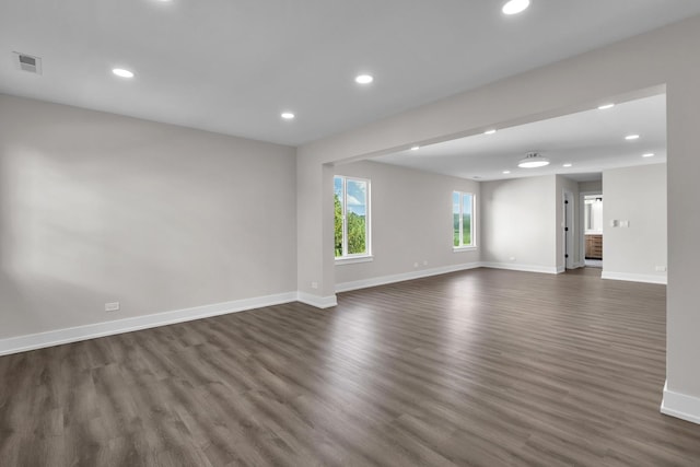 2054 S Jonathan Dr, Round Lake, IL 60073 - unfurnished living room with recessed lighting and dark wood finished floors