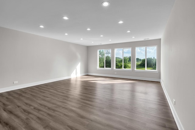 2054 S Jonathan Dr, Round Lake, IL 60073 - unfurnished room with recessed lighting and dark wood-style floors