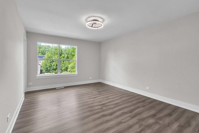 2054 S Jonathan Dr, Round Lake, IL 60073 - unfurnished room featuring dark wood-style floors