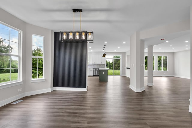 2054 S Jonathan Dr, Round Lake, IL 60073 - unfurnished dining area featuring plenty of natural light, dark wood-style floors, and recessed lighting